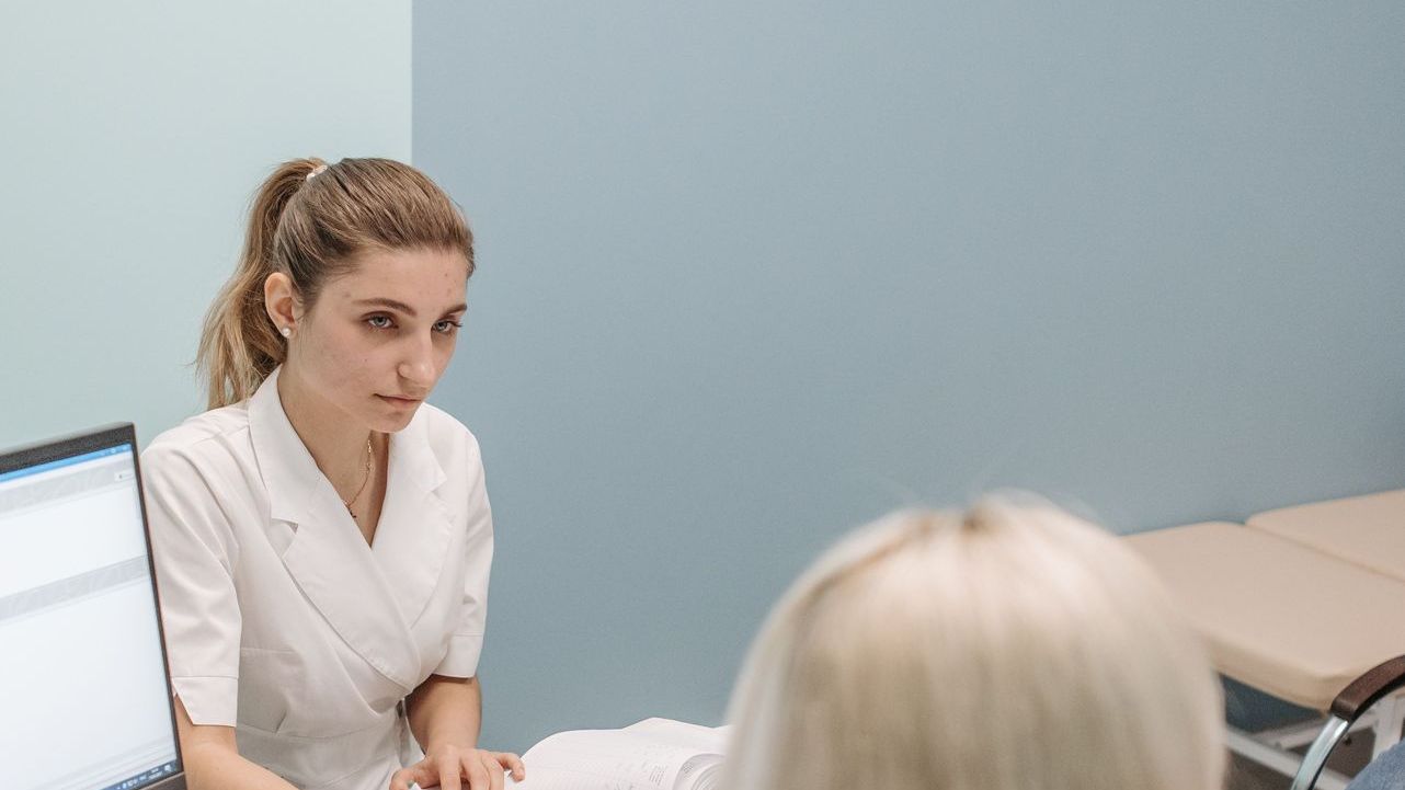 Doctor treating a visitor patient in Ontario