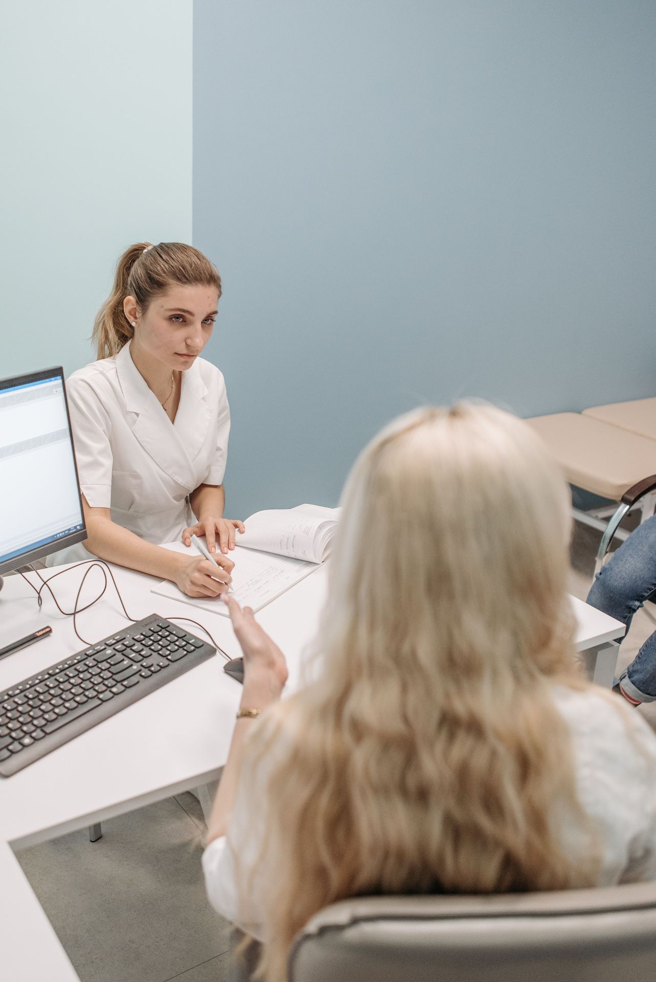 Doctor consulting with patient about critical illness insurance